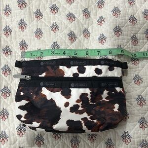 LeSportsac Black and Brown Cow Print Pouch